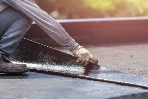 Professional Basement Waterproofing technician working in Versailles, KY